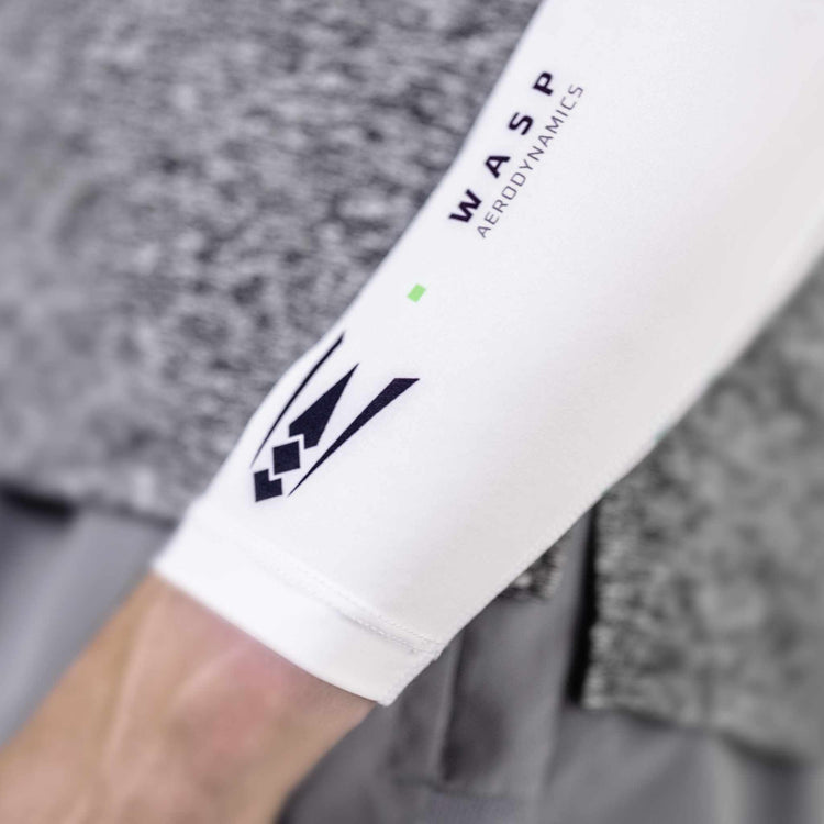 Close-up of a minimalistic cross-country arm sleeve, showcasing its sleek design and aerodynamic features, perfect for athletes seeking performance and comfort.